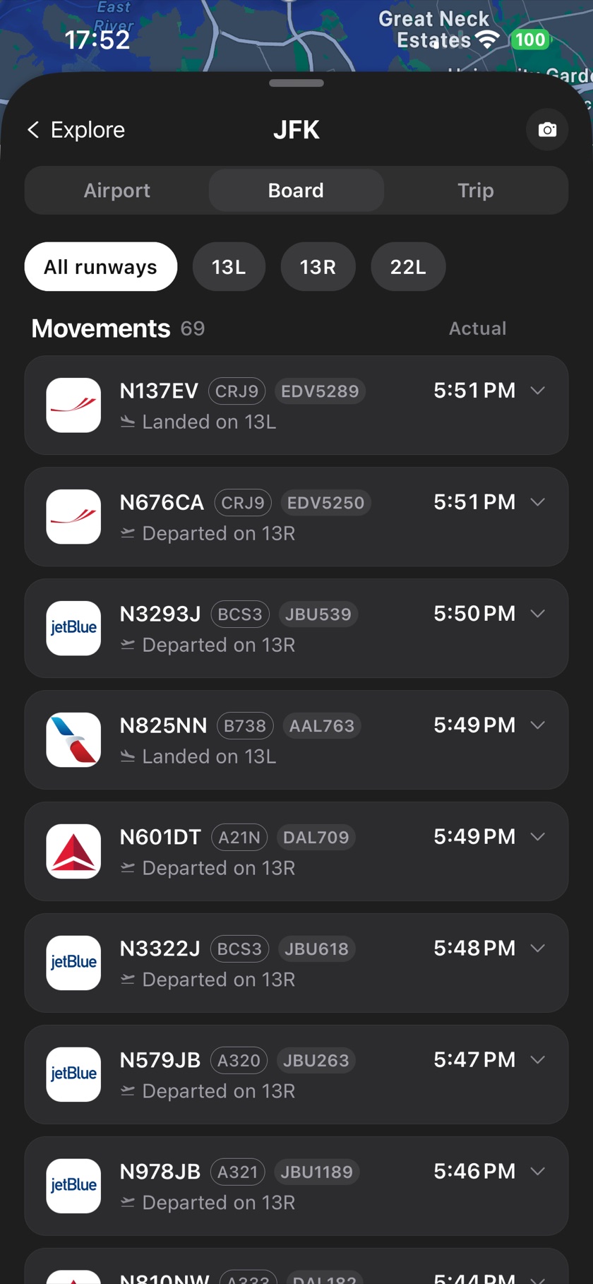The JFK board, each flight with its registration, type, runway and time